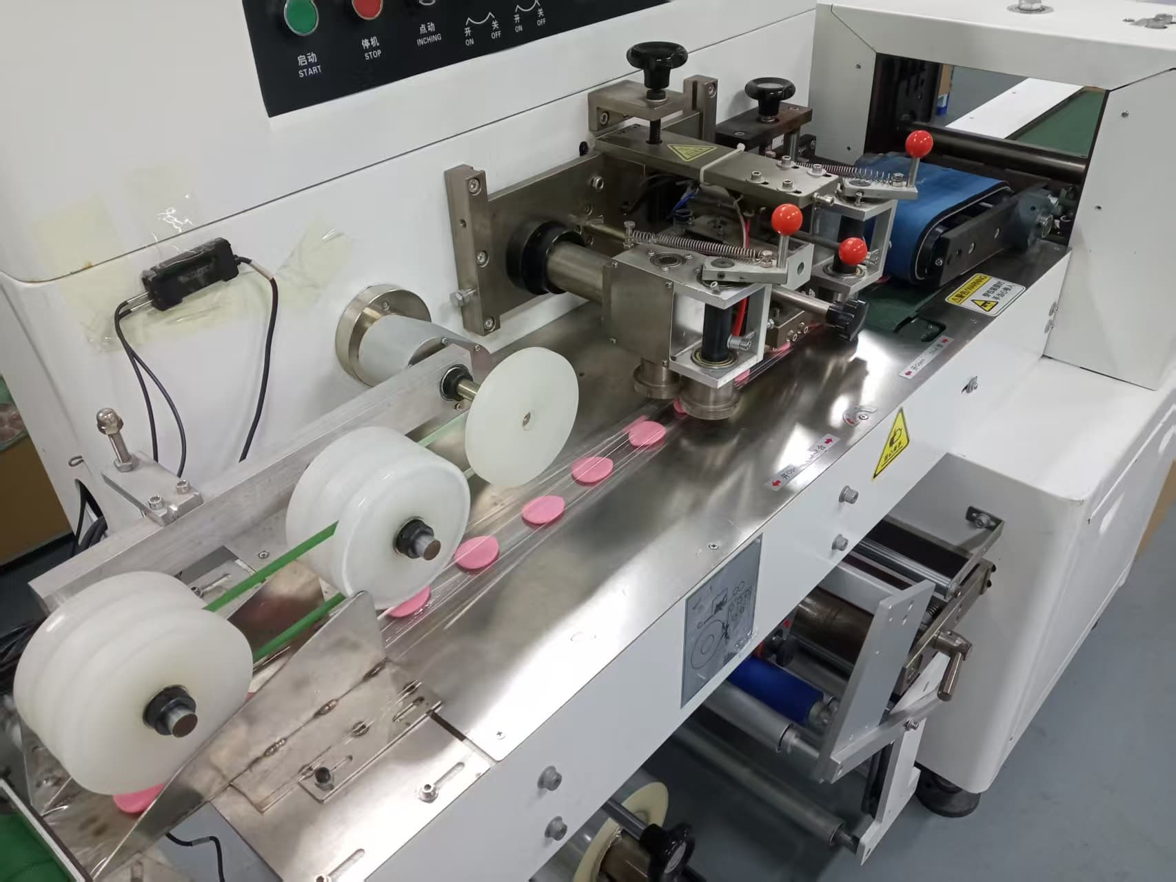 Production line with cosmetic puff components
